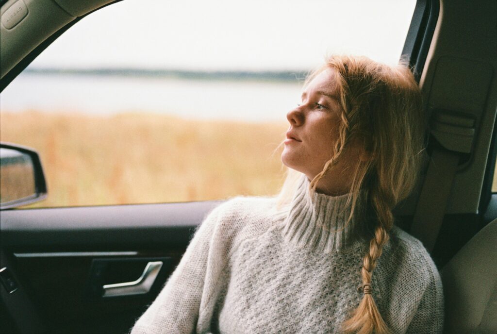 Person with psoriasis experiencing emotional distress, symbolizing mental health impact of chronic skin conditions